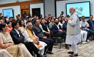 P M, Narendra Modi interacting with the film stars during the release of four cultural videos, in New Delhi on October 19, 2019